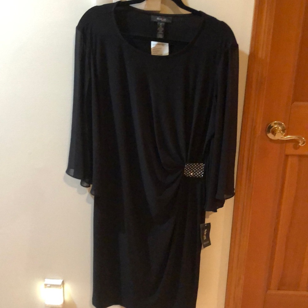 Black polyester and spandex formal dress.